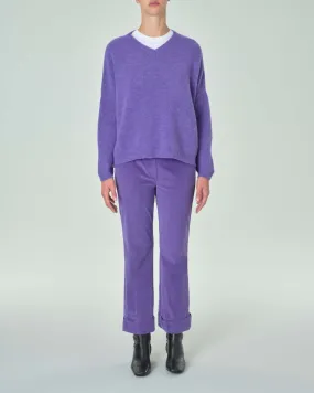 Pantaloni viola in velluto mille righe di cotone stretch dalla linea a trombetta